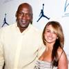 Michael Jordan and Yvette Prieto on the red carpet for the Michael Jordan Celebrity Invitational welcome party at Haze at Aria on March 30, 2011.