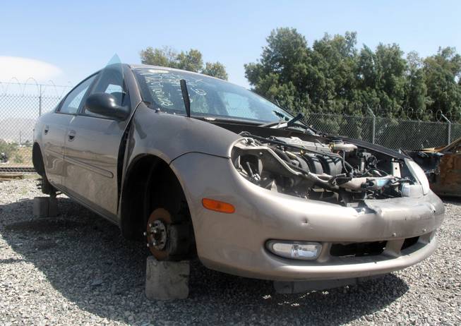 Metro Police launched a campaign called "Drive it. Protect it!" encouraging car owners to take more precautions in response to a slight increase in auto thefts recently. Repeat auto thieves will strip cars, like this vehicle at Ewing Brothers Towing Facility, and then sell the parts, police said.