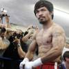 Filipino boxer Manny Pacquiao shows off his physique during a media day workout at the Wild Card Boxing Club in Hollywood, California Wednesday, April 20, 2011. Pacquiao is training for his upcoming welterweight fight against "Sugar" Shane Mosley of Pomona, Calif. on Saturday, May 7 at the MGM Grand Garden Arena.