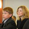 Photo: Eighth District Court Judge Susan Johnson helps He Photo: Eighth District Court Judge Susan Johnson helps He