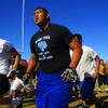 Photo: Desert Pines lineman Cedrick Poutasi heads for the Photo: Desert Pines lineman Cedrick Poutasi heads for the