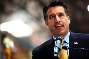 Gov. Brian Sandoval addresses the crowd during the ribbon-cutting ceremony for Amonix, a California-based solar power company that recently opened its new North Las Vegas facility, Tuesday, May 17, 2011.