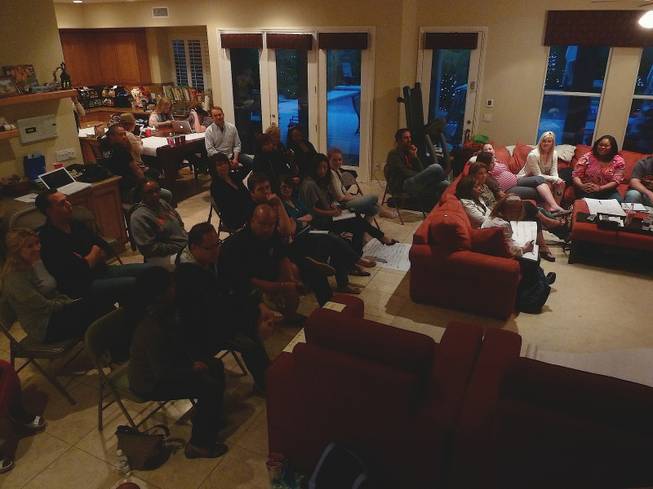 Gathered in the main room at the home of Tony Hsieh, CEO of Zappos.com, dozens of employees volunteered their time to work together to come up with a vision and them for a school they'd like to create in downtown Las Vegas. Zappos will move from Henderson into Las Vegas City Hall in 2013.