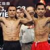 Juan Manuel Marquez (left) and Manny Pacquiao pose for a photo after weighing in for their 2008 bout. Pacquiao won by a split decision as part of his 14 fight winning streak. A deal has nearly been finalized for a third fight between the two. 