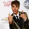 Photo: Justin Bieber poses backstage after winning the aw Photo: Justin Bieber poses backstage after winning the aw