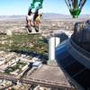 Michael and Jennifer Watkins, of Seattle, ride Insanity at the top of the Stratosphere in Las Vegas on Tuesday, June 7, 2011