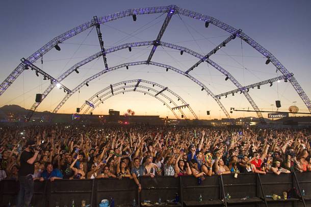 Carnival goers listen to music by Showtek during the Electric Daisy Carnival at the Las Vegas Motor Speedway early Monday morning June 27, 2011.