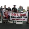 Friends and supporters mark the one-year anniversary of Erik Scott's death outside the Summerlin Costco, where he was fatally shot by Metro Police officers. Friends and supporters mark the one-year anniversary of Erik Scott's death outside the Summerlin Costco, where he was fatally shot by Metro Police officers.