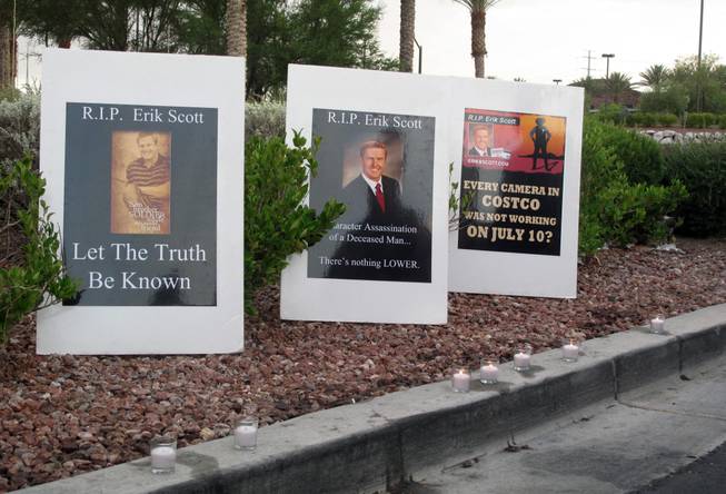 At a candlelight vigil Sunday evening to mark the one-year anniversary of Erik Scott's death, friends and supporters vowed to continue seeking justice. Scott was shot by Metro Police on July 10, 2010, at the Summerlin Costco after authorities say he pointed a gun at an officer. A coroner's jury ruled the fatal shooting justified.