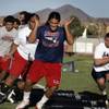 Kimo Seau practices during Liberty High School football practice in Henderson on Thursday, August 4, 2011.