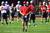 UNLV football head coach Bobby Hauck watches his team during practice at Rebel Park on Tuesday, Aug. 9, 2011.