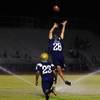 Photo: Spring Valley's Casey Taravella leaps for an overt
