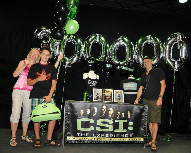 Doris Lanser, Daniel Diaz Lanser (the 300,000th guest at <em>CSI: The Experience</em>) and Daniel Diaz.