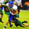 Photo: Moapa Valley running back Sean McConnell gets past Photo: Moapa Valley running back Sean McConnell gets past