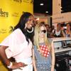 Avril Lavigne, right, at her Abbey Dawn clothing line booth during the 2011 MAGIC Marketplace Convention at the Las Vegas Convention Center on Aug. 22, 2011.

