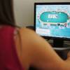 The state Gaming Control Board on Wednesday, Aug. 24, 2011, issued a draft of proposed regulations governing Internet poker. In this file photo, a woman who wished to remain anonymous plays online. The state Gaming Control Board on Wednesday, Aug. 24, 2011, issued a draft of proposed regulations governing Internet poker. In this file photo, a woman who wished to remain anonymous plays online.