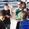 Mojave High School Principal Antonio Rael directs students to their respective homerooms on Monday, Aug. 29, 2011. 