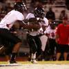 Photo: Las Vegas quarterback Hasaan Henderson hands the b Photo: Las Vegas quarterback Hasaan Henderson hands the b