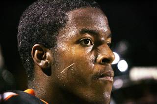 Chaparral High football player Toure Williams watches during a game at Chaparral against Coronado High on Friday, Sept. 9, 2011.