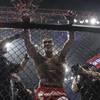 Photo: Antonio Silva smiles after upsetting Fedor Emelian