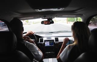 Mojave High School Principal Antonio Rael and Dean of Students Nathalie Burgess drive to an at-risk, 