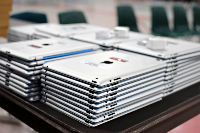 Stacks of iPad 2 tablets line the tables at Silverado High School on Tuesday, Sept. 13, 2011. The Clark County School District launched a pilot program using an iPad application to teach algebra to students at four schools during the 2011-12 school year. There will be 1,150 students using the algebra application on the iPad, developed by Houghton Mifflin Harcourt. The iPads with software cost the School District $790,050.