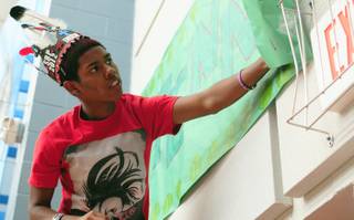 Western High School student body president Drew Limas, a 17-year-old senior, prepares the schools for its first pep rally of the year on Friday, Sept. 16, 2011.