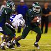 Photo: Green Valley running back Aaron Love looks for an Photo: Green Valley running back Aaron Love looks for an