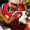 Photo: Liberty running back Niko Kapeli makes his way thr Photo: Liberty running back Niko Kapeli makes his way thr