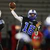 Photo: Basic quarterback Eddie Vega passes during a game Photo: Basic quarterback Eddie Vega passes during a game