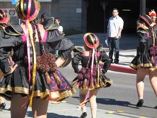 Young girls dance to Bolivian music representing the country in the annual Hispanic International Day Parade.