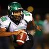 Photo: Virgin Valley's quarterback Humberto Urias scrambl Photo: Virgin Valley's quarterback Humberto Urias scrambl