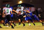 Virgin Valley's Dee Bowler carries the ball during a game between Virgin Valley High School and Moapa Valley High School in Overton on Friday, Oct. 14, 2011. The Moapa Pirates shut out the Bulldogs 18-0.