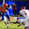 Photo: Bishop Gorman running back Nate Starks gets past t