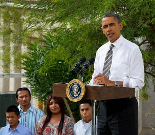 President Obama discussed the American Jobs Act and a housing plan outside Jose and Lissette Bonilla's home in Las Vegas on Oct. 24, 2011.