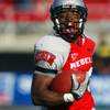 UNLV's Deante' Purvis celebrates after returning a kickoff 98 yards for a touchdown at Sam Boyd Stadium on Saturday, Oct. 29, 2011.