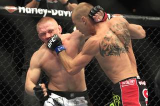Donald Cerrone lands a left on Dennis Siver during their bout at UFC 137 Saturday, Oct. 29, 2011 at the Mandalay Bay Events Center. Cerrone won via sumbission in the first round.