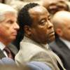 Photo: Dr. Conrad Murray listens as the jury returns with Photo: Dr. Conrad Murray listens as the jury returns with