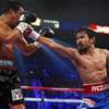 Manny Pacquiao, right, of the Philippines punches at Juan Manuel Marquez of Mexico during their WBO welterweight fight at the MGM Grand Garden Arena Saturday, Nov. 12, 2011. Pacquiao won the 12-round fight by majority decision. Manny Pacquiao, right, of the Philippines punches at Juan Manuel Marquez of Mexico during their WBO welterweight fight at the MGM Grand Garden Arena Saturday, Nov. 12, 2011. Pacquiao won the 12-round fight by majority decision.