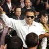 Photo: Boxing legend Muhammad Ali attends the welterweigh