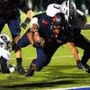 Photo: Bishop Gorman running back Shaquille Powell dives 