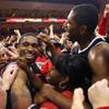 Photo: UNLV's Oscar Bellfield, left, and Mike Moser are m