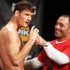 Photo: Michael Bisping, left, talks with Joe Rogan during