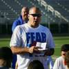 Photo: Bishop Gorman head coach Tony Sanchez, with detail
