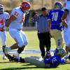 Photo: Bishop Gorman tackle Zach Singer stands over Reed 