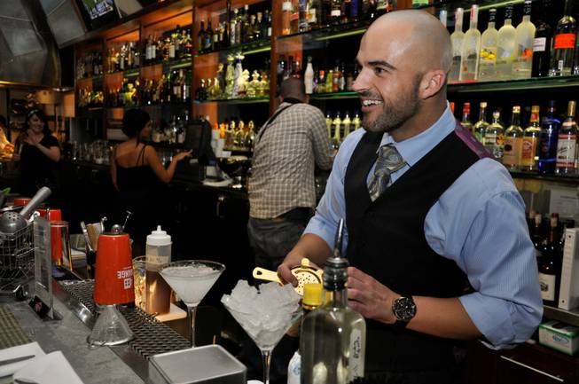 Lead bartender J.R. Starkus of RM Seafood at Mandalay Bay ...