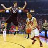 Photo: UNLV forward Chace Stanback is guarded by Louisian