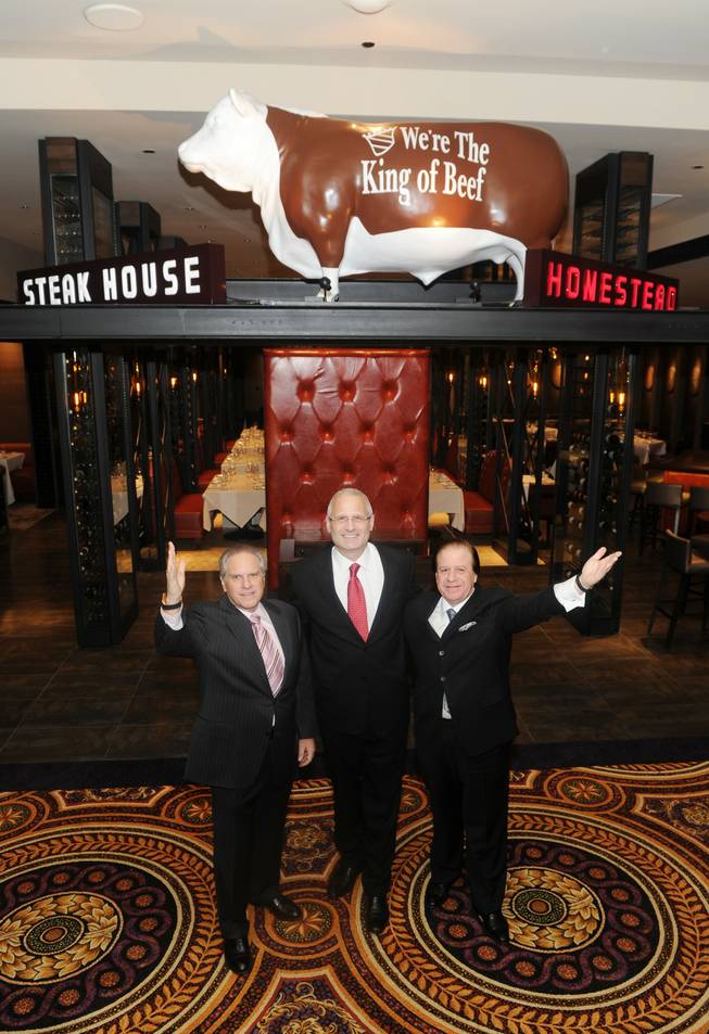 Greg Sherry, Gary Selesner and Marc Sherry at Homestead Steak House in Caesars Palace.