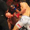 Photo: Middleweight champion Luke Rockhold pounds Keith J