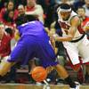 Photo: UNLV guard Oscar Bellfield dribbles through the le